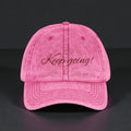 Keep Going Embroidered Vintage Cap — Distressed Pink Motivational Hat