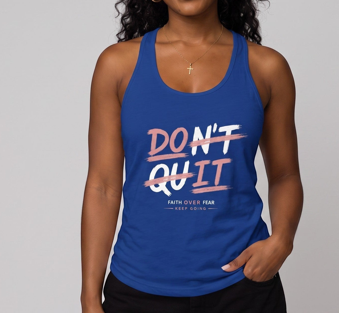 Spirit & Strings blue racerback tank top with Don't Quit Do It graphic print worn by a smiling woman